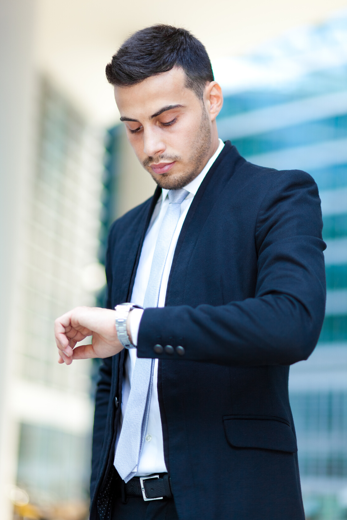 Business Man Looking at His Watch